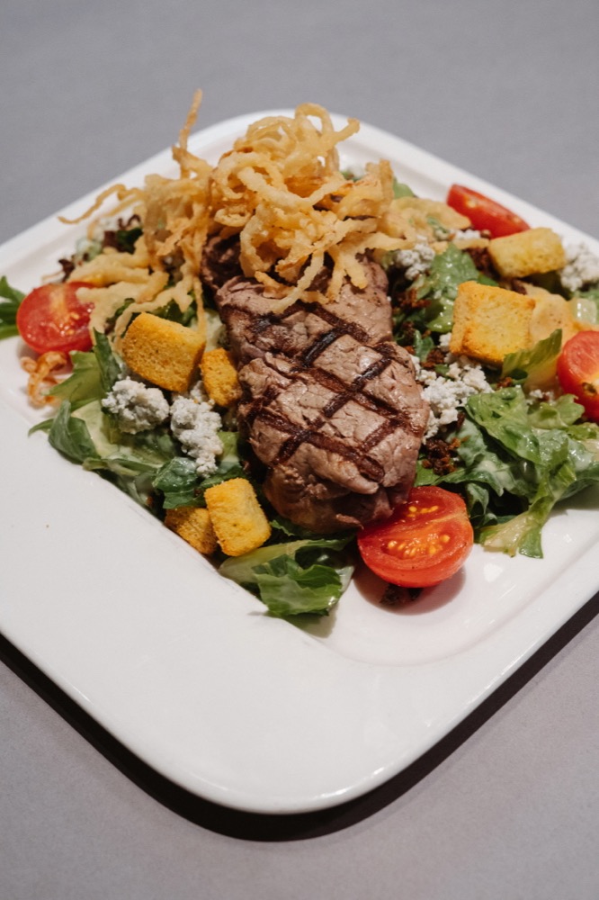 Steak salad served at Fathoms